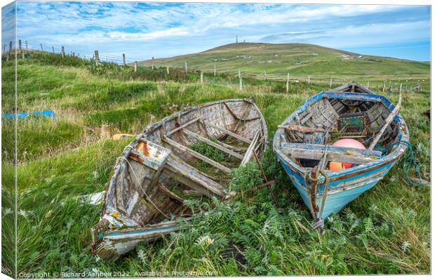 Old decaying Shetland fishing boats Canvas Print by Richard Ashbee