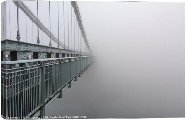 The Menai Suspension Bridge disappears into the fog  Canvas Print by Tim Snow