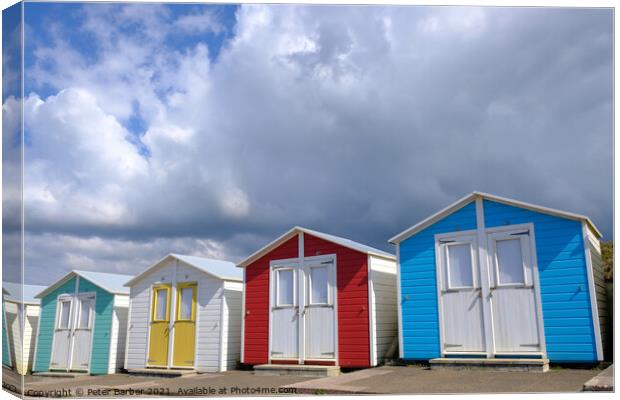 Beach huts near Bude Canvas Print by Peter Barber