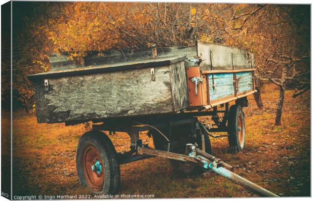 Full harvest trailer standing on the field in autumn Canvas Print by Ingo Menhard