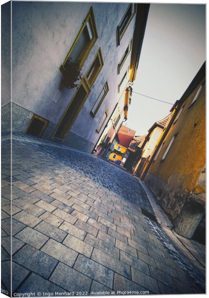 Small alley in a Bavarian village Canvas Print by Ingo Menhard