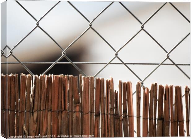 Metallic fence outside - good for wallpapers Canvas Print by Ingo Menhard