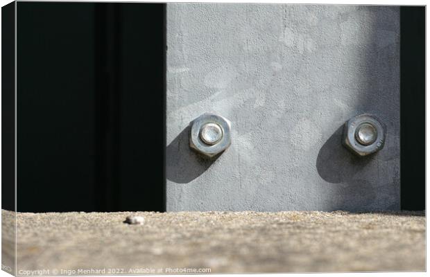 Two big screws in a steel plank Canvas Print by Ingo Menhard