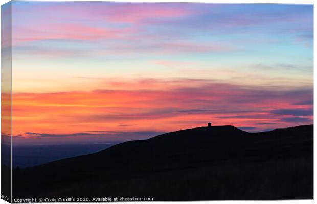 Colorful sunset over Rivington Pike Canvas Print by Craig Cunliffe
