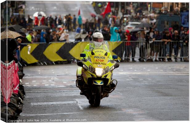 Cycling road race police support Canvas Print by John Rae