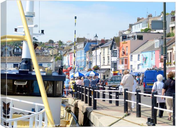 Brixham seafront in Devon. Canvas Print by john hill