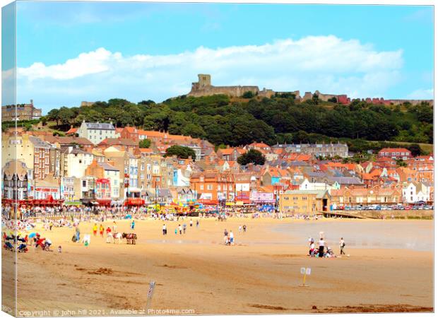 Scarborough South beach in North Yorkshire. Canvas Print by john hill