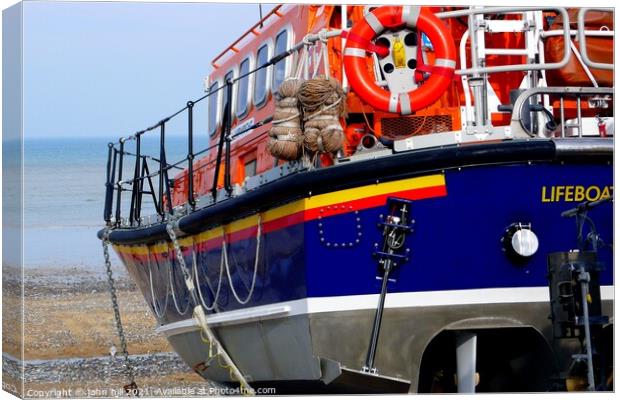 Cromer Lifeboat ready to launch from the beach. Canvas Print by john hill