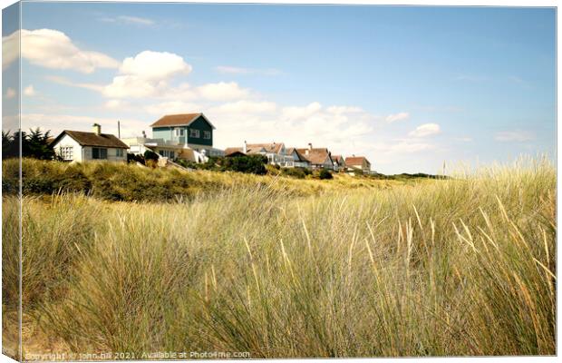 Coastal Property at Anderby creek. Canvas Print by john hill