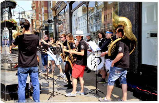 Band of Buskers, Leeds, Yorkshire, UK Canvas Print by john hill