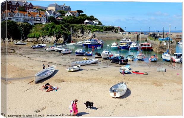 Harbor beach, Newquay, Cornwall. Canvas Print by john hill