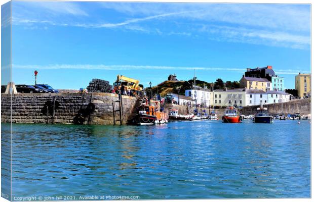 Returning Ferry, Tenby, Wales. Canvas Print by john hill