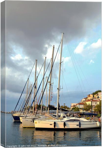 Safe Moorings in Portrait at Skiathos Canvas Print by john hill