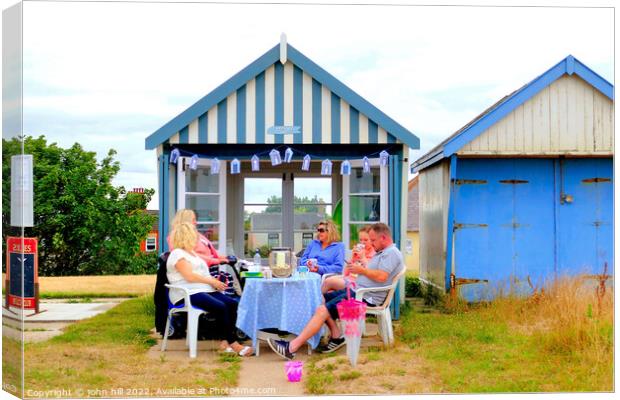 Beach hut tea party. Canvas Print by john hill