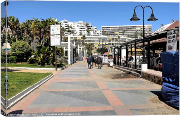 South seafront promenade, Torremolinos, Spain. Canvas Print by john hill