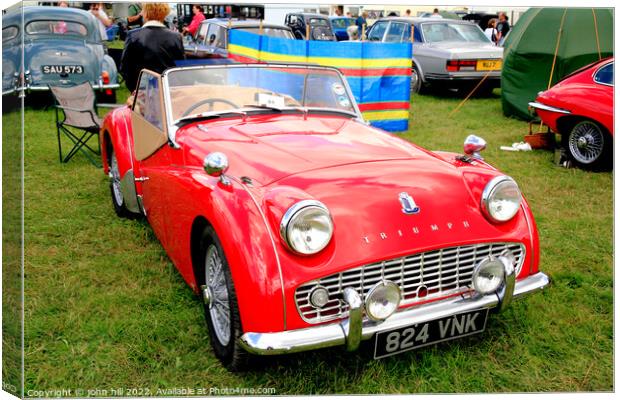 1959 Triumph TR3A red Canvas Print by john hill