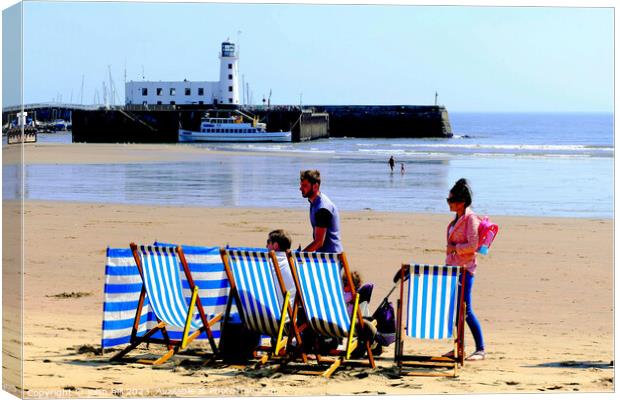 day on the beach. Canvas Print by john hill