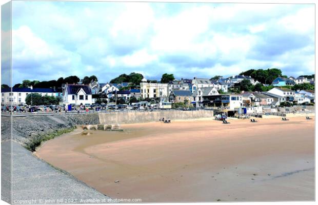 Beach and town, Saundersfoot, South Wales, UK. Canvas Print by john hill
