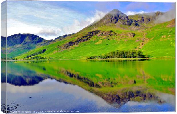 Mountain reflections, Cumbria, UK. Canvas Print by john hill