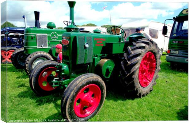 Powerful Vintage Tractor at Cromford Steam Rally Canvas Print by john hill