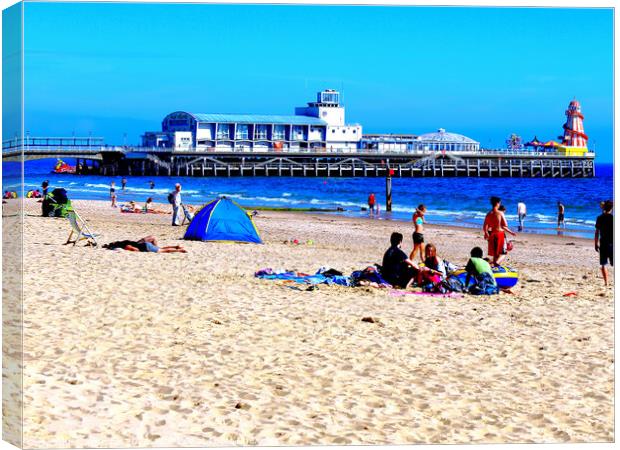 Sunshine and Fun at Bournemouth Pier Canvas Print by john hill