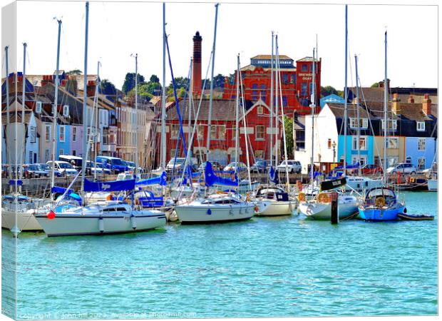 Vibrant Quay with Yachts in Weymouth Canvas Print by john hill