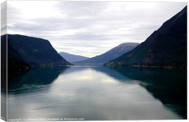 Norwegian Fjord: Serene Lustrafjorden Illumination Canvas Print by john hill