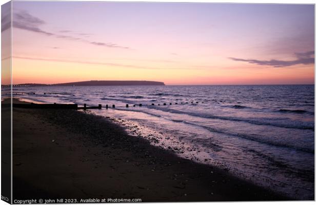 Sunrise over Sandown bay, Isle of Wight Canvas Print by john hill