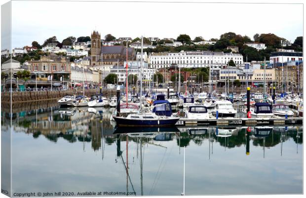 Reflection in the Inner harbour at Torquay devon. Canvas Print by john hill