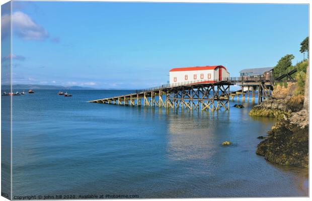 The old lifeboat station at Tenby, Wales.  Canvas Print by john hill