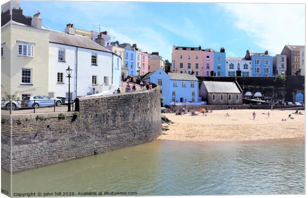 The beautiful harbour  and beach of Tenby Wales.  Canvas Print by john hill