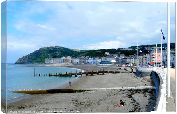Tha Seafront at Aberystwyth in Wales. Canvas Print by john hill