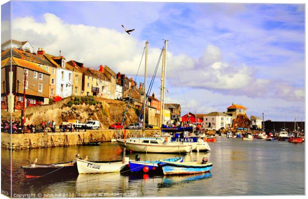 The quay at Mevagissey in Cornwall.  Canvas Print by john hill