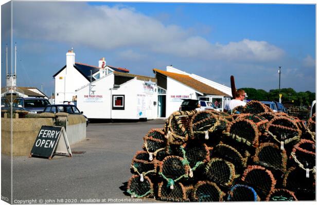 The fish stall at Mudeford Quay in Dorset. Canvas Print by john hill