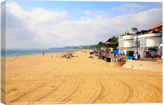 The beach looking South from the pier at Bournemouth in Dorset. Canvas Print by john hill