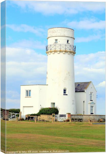 The old lighthouse now a home at Old Hunstanton in Norfolk. Canvas Print by john hill