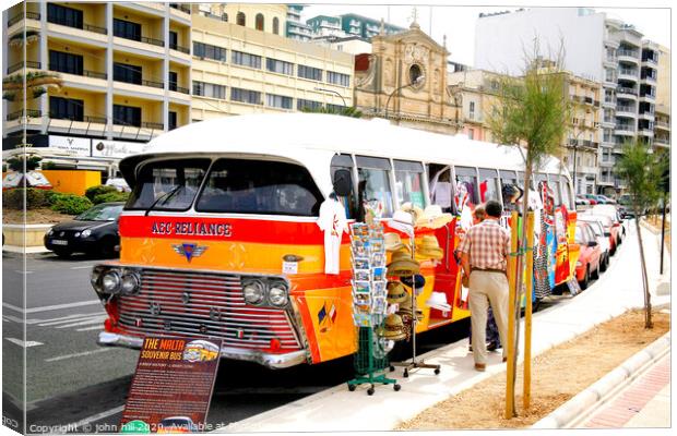 Souvenir bus on the seafront at Silema in Malta. Canvas Print by john hill
