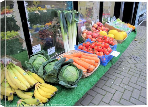 Vegetables on display at Scarborough in Yorkshire. Canvas Print by john hill