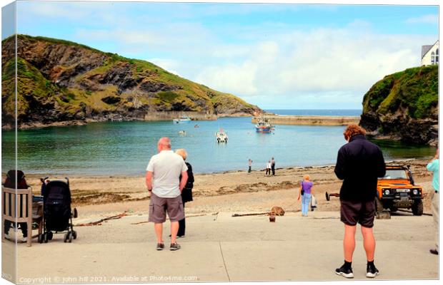 Slipway and Harbour at Port Isaac in Cornwall. Canvas Print by john hill