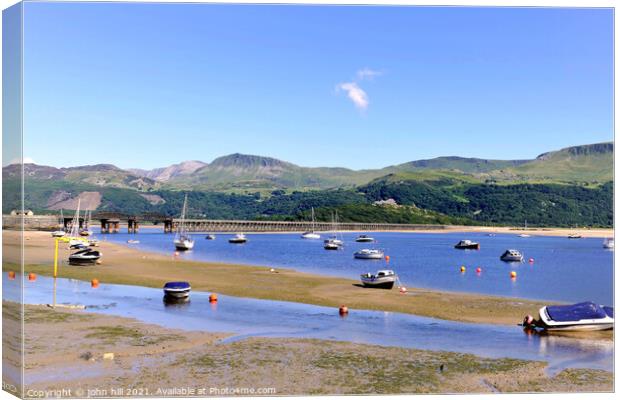 Barmouth harbour and Bridge in Wales.  Canvas Print by john hill