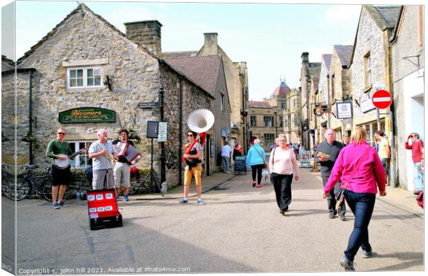 Street buskers at Bakewell in Derbyshire. Canvas Print by john hill