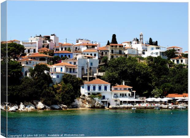 Skiathos town from the sea Canvas Print by john hill