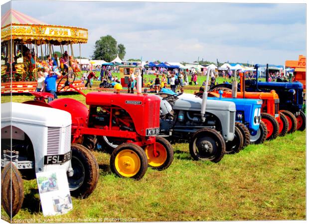 Various tractors at Country Show. Canvas Print by john hill