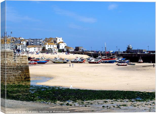 Low tide at St. Ives in Cornwall. Canvas Print by john hill