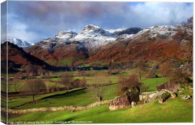 Dusting of snow on the Langdales Canvas Print by Doug Burke