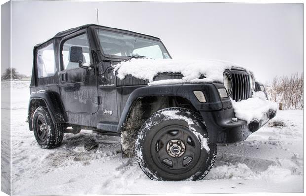 Jeep in the Snow Canvas Print by Eddie Howland
