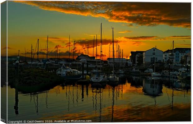 Sunset over Carrickfergus harbour. Canvas Print by Cecil Owens