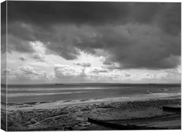 Black and white seascape across Thames Estuary from Thorpe Bay, Essex, UK. Canvas Print by Peter Bolton