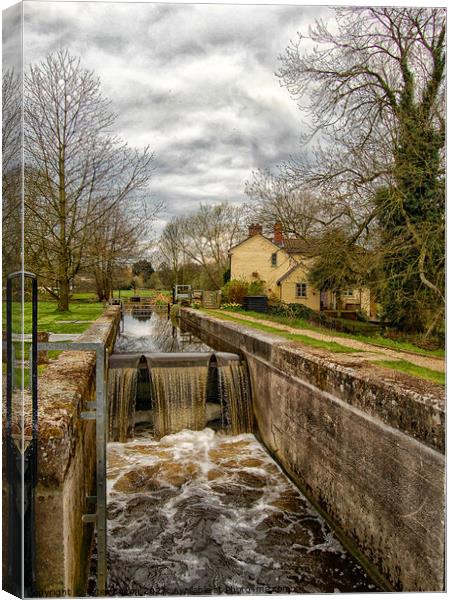 A view across a lock at Dedham, Suffolk, UK Canvas Print by Peter Bolton