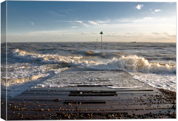 Outgoing tide at Sailing club jetty, Thorpe Bay, Essex, UK. Canvas Print by Peter Bolton
